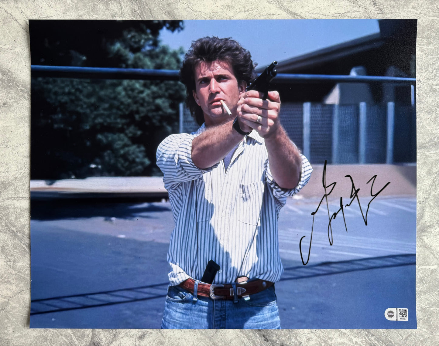 Mel Gibson Signed Lethal Weapon 16x20” Photo - SWAU Authenticated