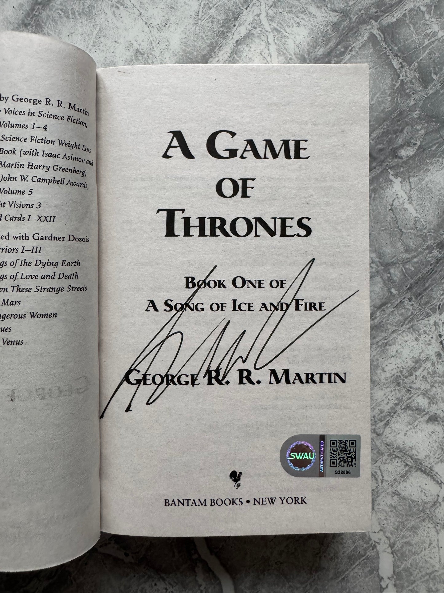 George R.R Martin Signed Game Of Thrones Paperback Book - SWAU Authenticated