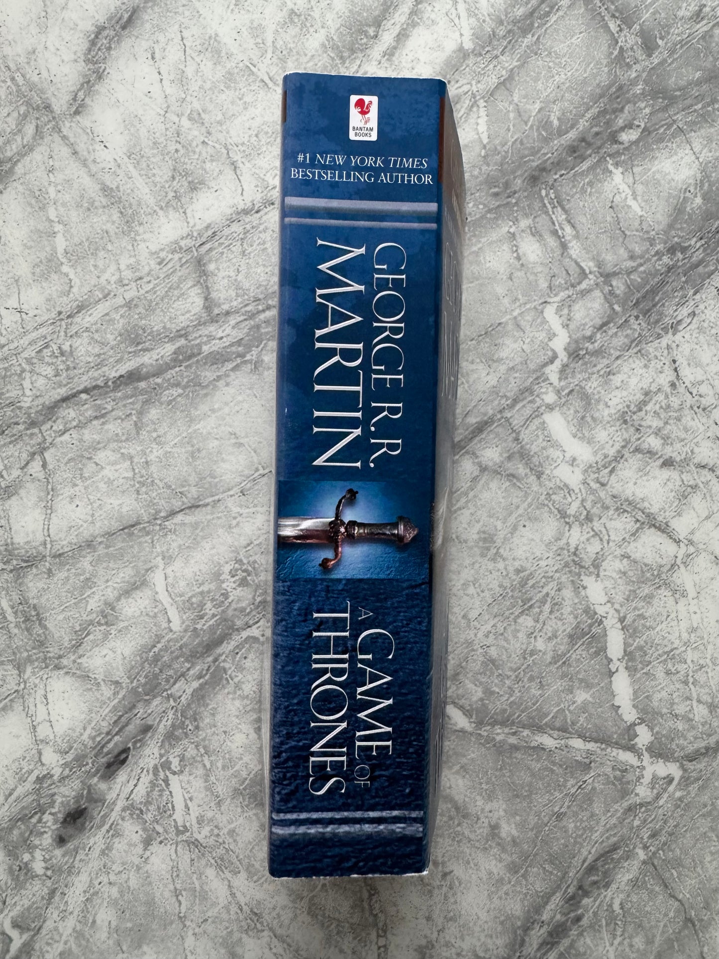 George R.R Martin Signed Game Of Thrones Paperback Book - SWAU Authenticated