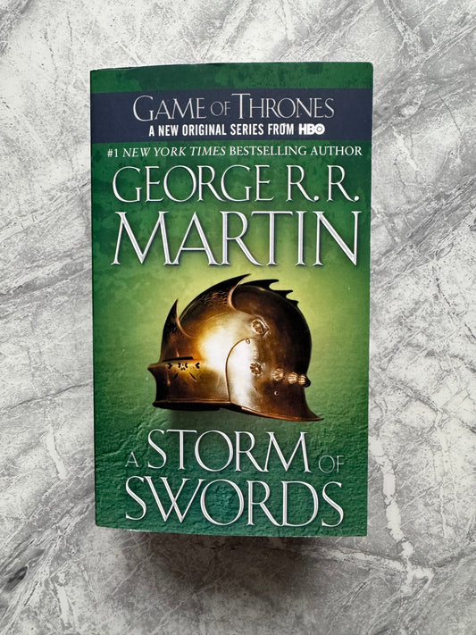 George R.R Martin Signed A Storm Of Swords Paperback Book - SWAU Authenticated