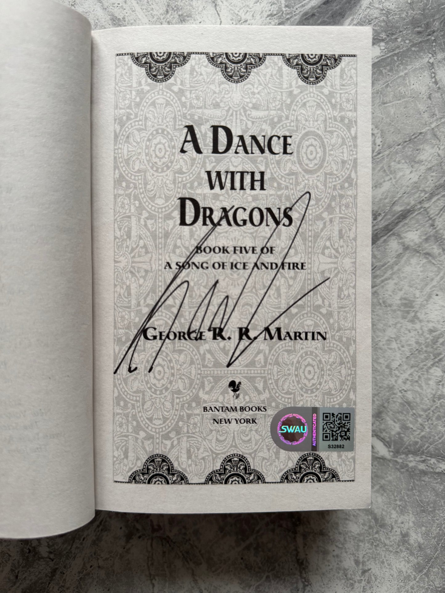 George R.R Martin Signed A Dance With Dragons Paperback Book - SWAU Authenticated