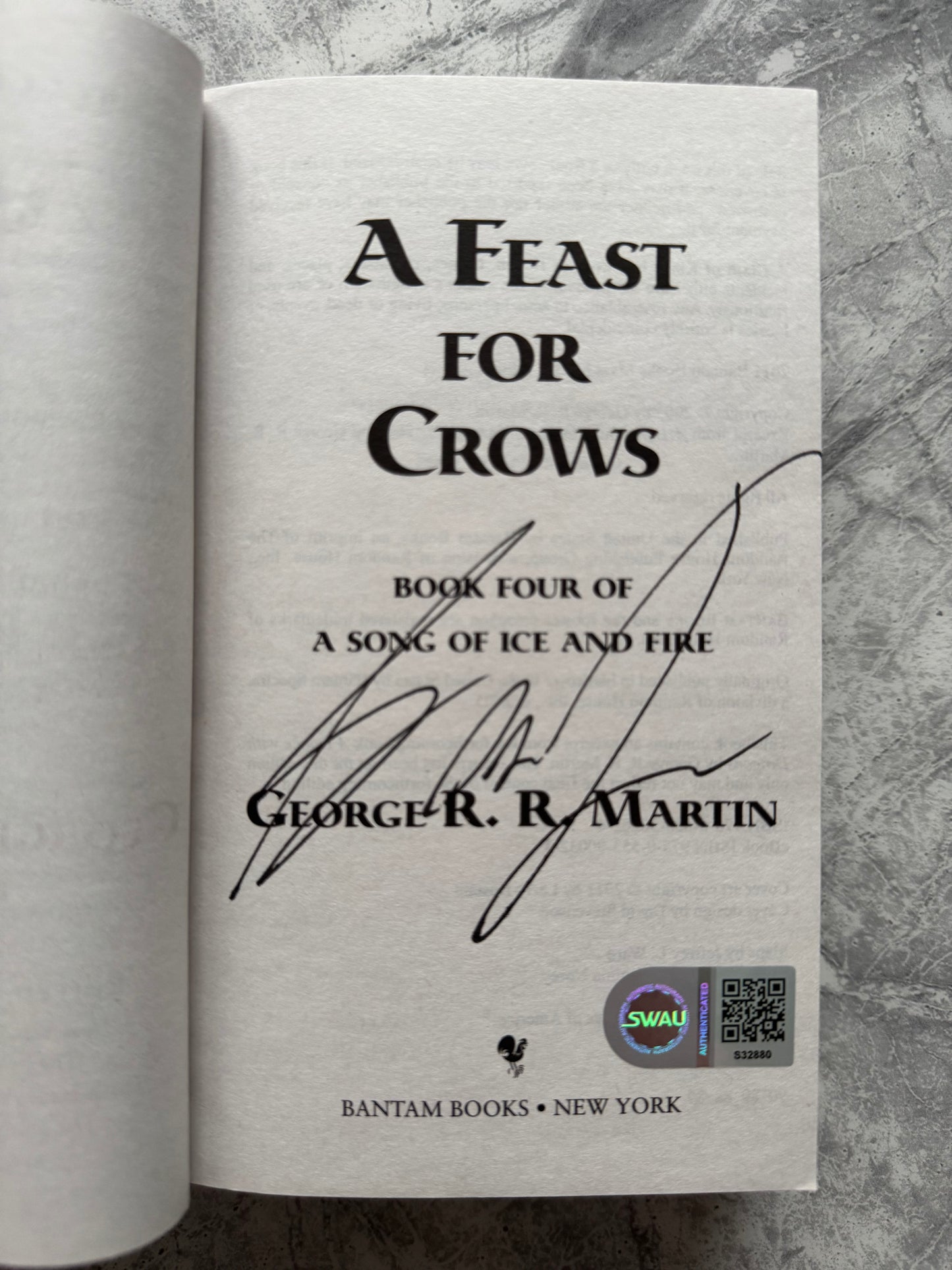 George R.R Martin Signed A Feast For Crows Paperback Book - SWAU Authenticated